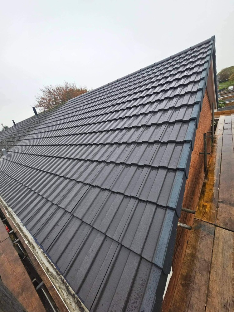 Complete roof replacement with modern slate tiles