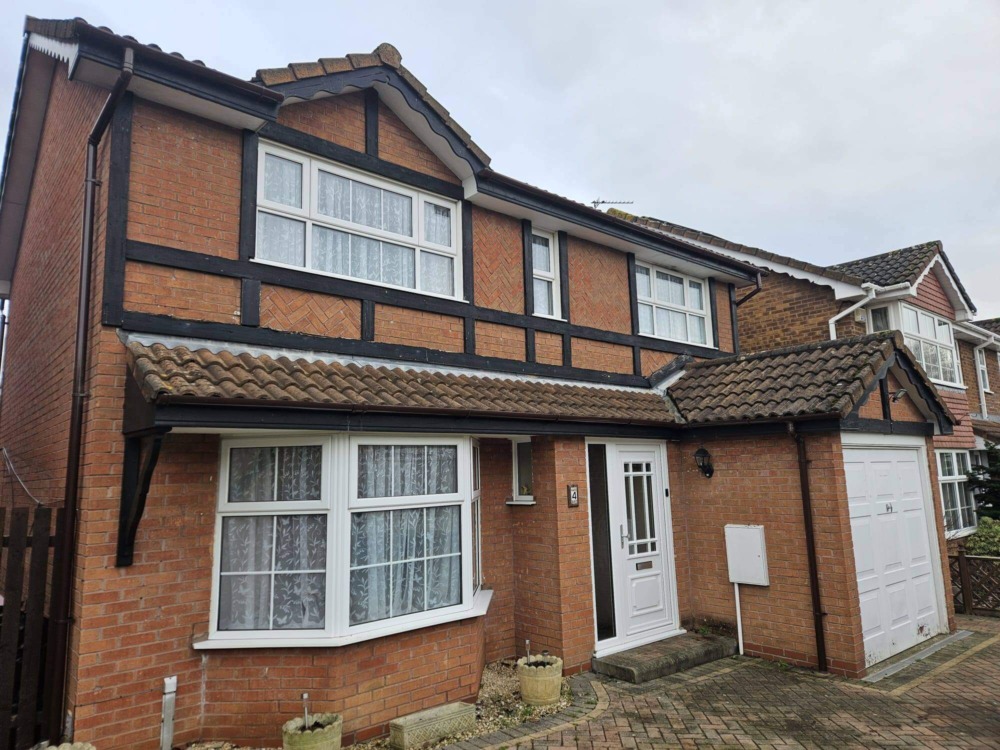 Guttering system replacement along roofline